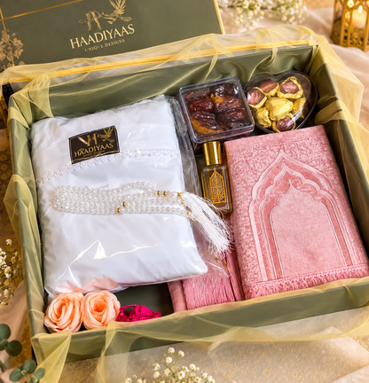 HAADIYAAS Premium Cotton Prayer Gift Hamper with white cotton prayer dress, pink prayer mat, tasbeeh, attar, dates and chocolates